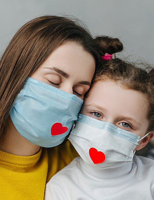 caring-young-mother-embrace-little-cute-child-daughter-wearing-facial-medical-mask-red-heart-it-as-way-show-appreciation-thank-all-essential-employees-during-covid-19-pandemic